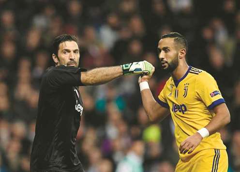 Benatia (R) with Buffon.