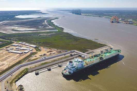The Asia Vision LNG carrier sits docked at the Cheniere Energy terminal in this aerial photograph taken over Sabine Pass, Texas, on February 24, 2016. More new tankers were ordered in the first quarter of 2018 to carry liquefied natural gas than in all of 2017. Still, the buildout wonu2019t come fast enough to meet growing global demand.