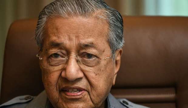 Former Malaysia's prime minister Mahathir Mohamad speaks during an interview with Agence France-Presse (AFP) at his office in Kuala Lumpur.