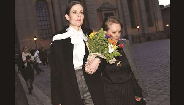 Danius and fellow academy member Sara Stridsberg leaving a meeting at the Swedish Academy in Stockholm late on Thursday.