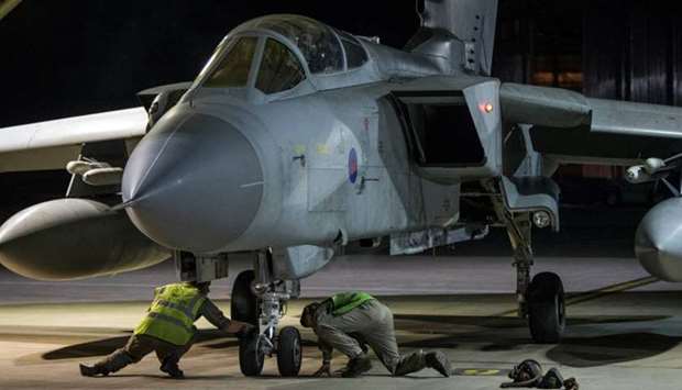 An RAF Tornado taxis into its hangar in Akrotiri, Cyprus April 14, 2018, after completing its mission