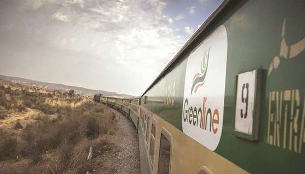A Green Line Express train, operated by Pakistan Railways, travels near Jhelum en route from Islamabad to Karachi. Beijing is set to upgrade a 1,163-miles track from Karachi to Peshawar near the Afghan border with an $8bn loan to Pakistan.