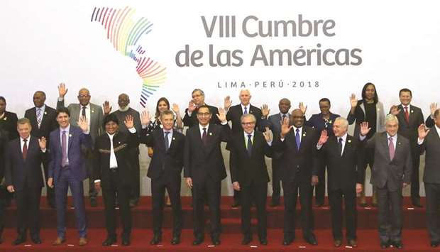 Heads of states pose for a family photo at the VIII Summit of the Americas in Lima yesterday.