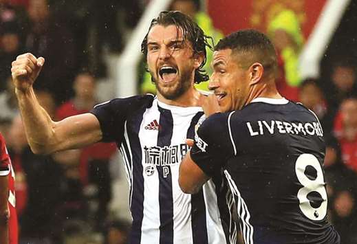 West Bromwich Albionu2019s Jay Rodriguez (left) celebrates with teammate Jake Livermore after scoring against Manchester United in the Premier League. (Reuters)