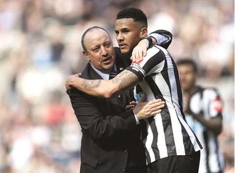Newcastle United manager Rafael Benitez (left) and Jamaal Lascelles celebrate after the win over Arsenal. (Reuters)