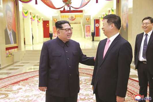 North Korean leader Kim Jong-un meets Song Tao, the head of the  Chinau2019s Communist Partyu2019s International Department who led a Chinese troupe to North Korea for the April Spring Friendship Art Festival, in this photo released by Korean Central News Agency (KCNA), yesterday.