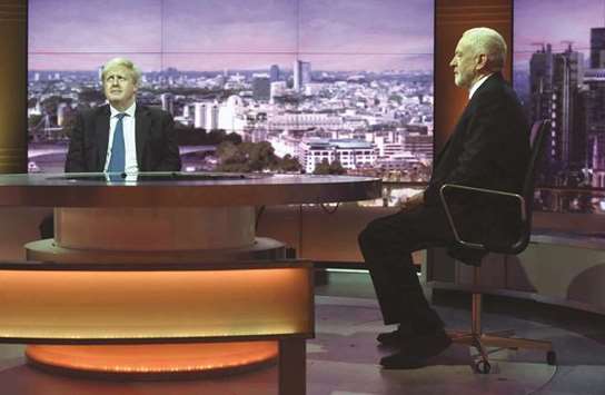 Foreign Secretary Boris Johnson and Jeremy Corbyn, the leader of the Labour Party, attend the BBCu2019s Andrew Marr Show in London yesterday.