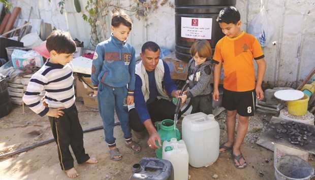 Quenching their thirst: Qatar Charityu2019s projects were implemented with the aim of providing families with clean water.