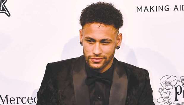 PSGu2019s Brazilian footballer Neymar attends the American Foundation for Aids Research gala in Sao Paulo, Brazil. (AFP)