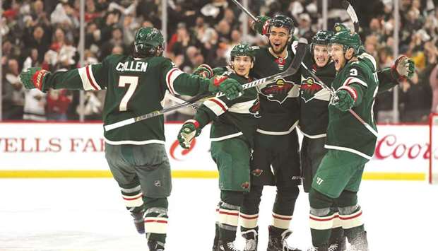 Jordan Greenway (centre) of Minnesota Wild celebrates his goal with teammates against Winnipeg Jets during Game Three of the Western Conference First Round in St Paul, Minnesota, on Sunday. (AFP)