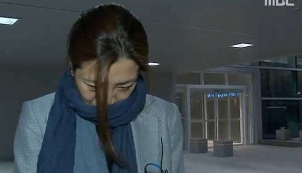 Cho Hyun-min, a senior vice president at Korean Air Lines and a daughter of its chairman Cho Yang-ho, arrives at Incheon International Airport in Incheon, South Korea, in this still image from MBC exclusive news report footage obtained by Yonhap on April 15, 2018.