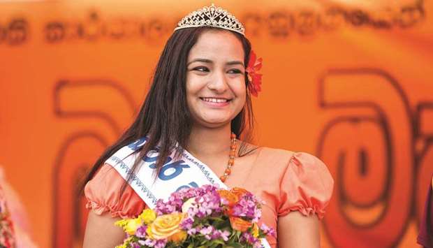 QUEEN: Winner of Avurudu Kumariya, a competition where young women dressed in traditional attire parade on stage for selection of the New Year queen.