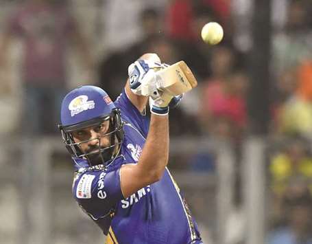 Mumbai Indians captain Rohit Sharma plays a shot against Royal Challengers Bangalore during their Indian Premier League match at the Wankhede stadium in Mumbai yesterday. (AFP)