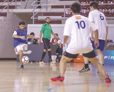 Action from the match between Aspire Zone and Spanish embassy.