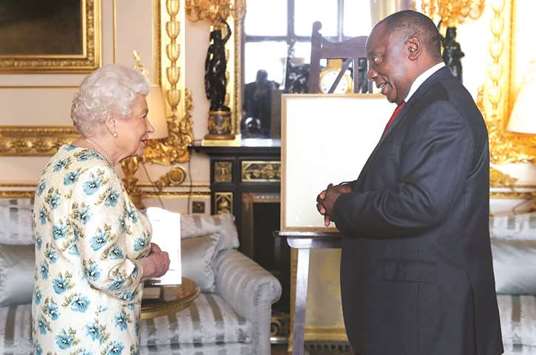Britainu2019s Queen Elizabeth II greets South Africau2019s President Cyril Ramaphosa during an audience at Windsor Castle on the sidelines of the Commonwealth Heads of Government meeting.