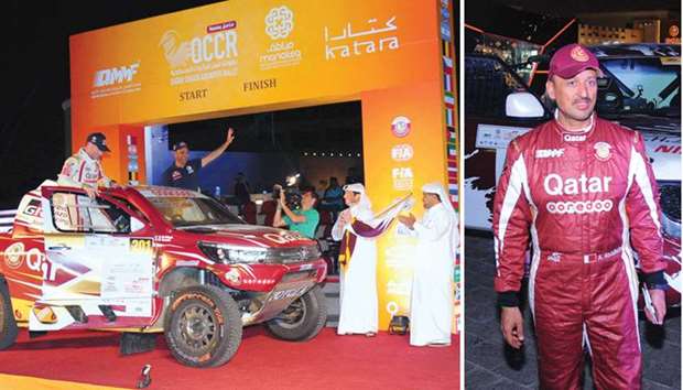 Qatari star Nasser Saleh al-Attiyah and his French co-driver Mathieu Baumel arrive at the ceremonial start of the Manateq Qatar Cross-Country Rally at Katara u2013 the Cultural Village in Doha yesterday. Manateq CEO Fahad al-Kaabi and QMMF president Abdulrahman al-Mannai flagged off the contestants. (Right) Qataru2019s Adel Abdulla will be looking to take the lead in the FIA T2 Championship. PICTURES: Ram Chand
