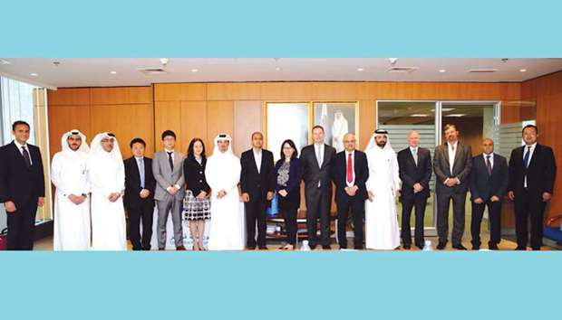 The delegation representing SZSE and China Merchant Securities with QSE officials after their talks in Doha yesterday.