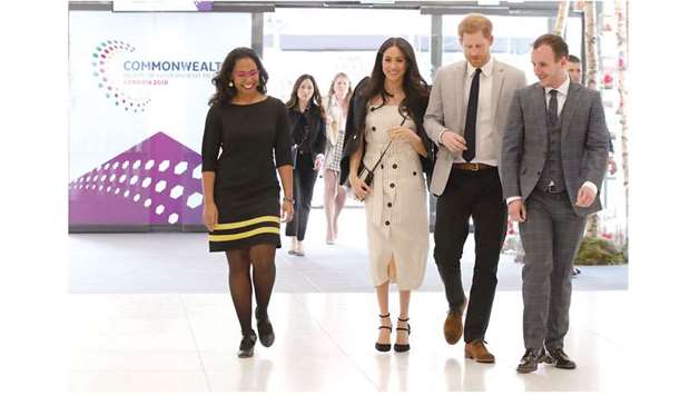 Prince Harry and his fiancee Meghan Markle arrive for a reception with delegates from the Commonwealth Youth Forum at the Queen Elizabeth II Conference Centre, London, yesterday.