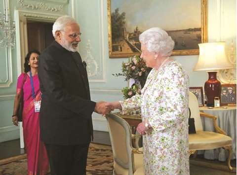 Prime Minister Narendra Modi is greeted by Britainu2019s Queen Elizabeth II during a private audience at Buckingham Palace in London yesterday.