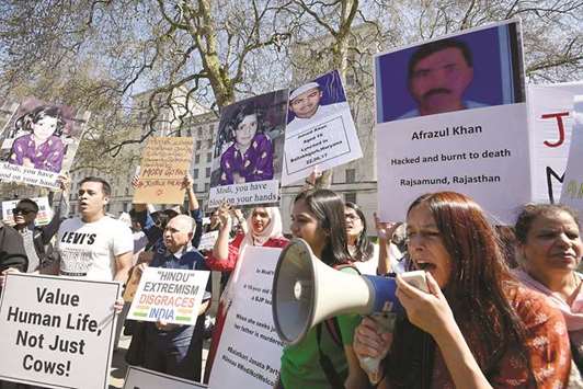 Demonstrators stage a protest against the visit by Prime Minister Narendra Modi opposite Downing Street in London yesterday.