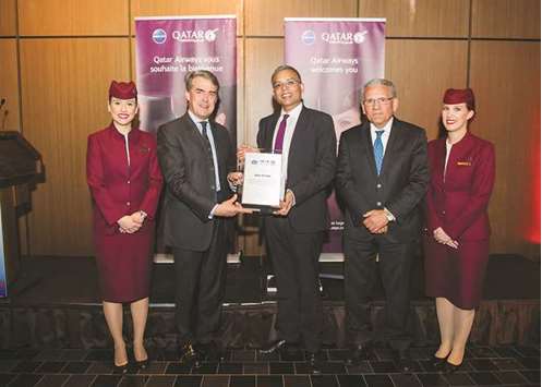 Jain (centre) receives the award from IATA director general and CEO Alexandre de Juniac in Montreal recently.