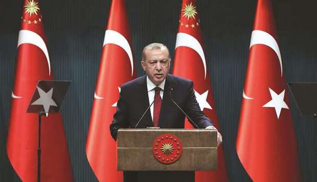 Turkish President Recep Tayyip Erdogan addresses a press conference at the Presidential Complex in Ankara yesterday.