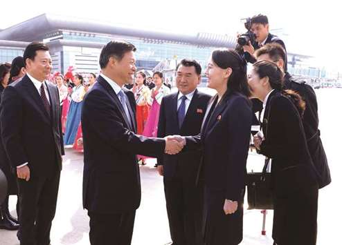 Kim Yo-jong, alternate member of the Political Bureau and first vice department director of the WPK Central Committee of North Korea, shaking hands with Song Tao, head of the International Liaison Department of the Central Committee of the Communist Party of China during the departure of a Chinese art troupe at Pyongyang airport.