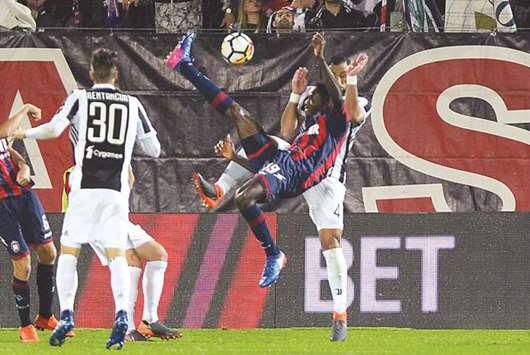 Crotoneu2019s Simy scores a goal with a overhead kick against Juventus in the Serie A at the Ezio Scida Municipal Stadium in Crotone, Italy, on Wednesday. (Reuters)