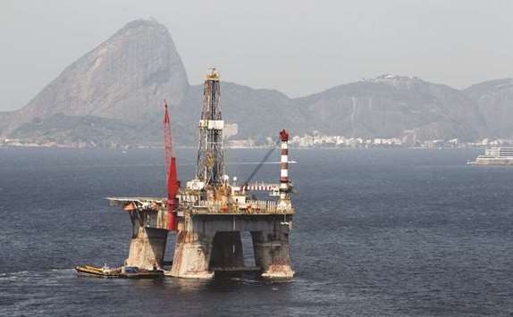 A Petrobras oil platform is seen at Guabanara Bay in Rio de Janeiro, Brazil (file). Oil prices surged yesterday close to 3.5-year peaks on simmering Mideast tensions and keen US demand.