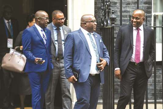 Timothy Harris, St Kitts and Nevis Prime Minister, and other Caribbean leaders and representatives leave following a meeting with Britainu2019s Prime Minister Theresa May at 10 Downing Street in London. May has been caught off-guard by the Windrush issue.