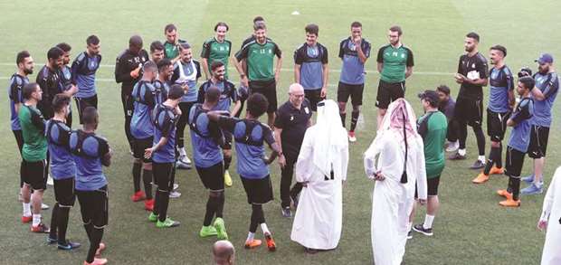 Al Sadd coach Jesualdo Ferreira (centre) with his players during a training session yesterday. PICTURES: Jayan Orma