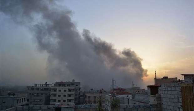 Smoke billows from an explosion in a southern district of Damascus on Thursday.