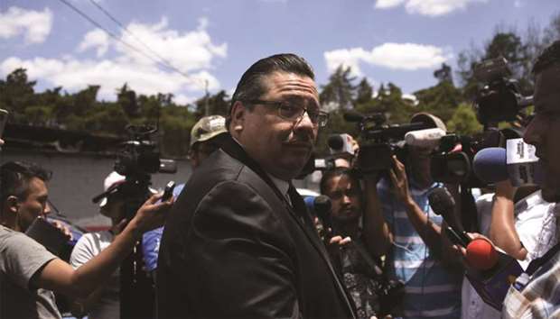 Luis Rosales, lawyer of former Guatemalan dictator general Jose Efrain Rios Montt speaks to the press outside the former dictatoru2019s residence in Guatemala City yesterday moments after his death was announced.