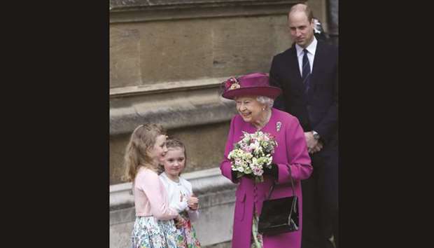 Queen Elizabeth leaves the annual Easter Sunday service at St Georgeu2019s Chapel at Windsor Castle in Windsor yesterday.