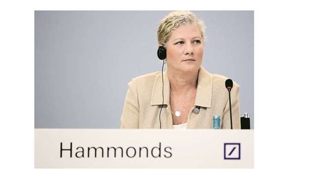 Kim Hammonds, COO of Deutsche Bank, looks on during a press conference in Frankfurt. Hammonds, who reportedly called Deutsche Bank u201cthe most dysfunctional companyu201d sheu2019d ever worked for, will leave u201cby mutual agreementu201d at the annual general meeting on May 24, the lender said.