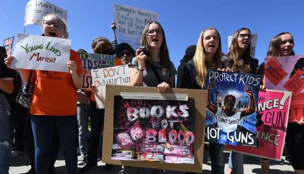 Students from the Santa Monica area participate in a walkout demonstration as part of the National School Walkout for Gun Violence Prevention campaign in Santa Monica