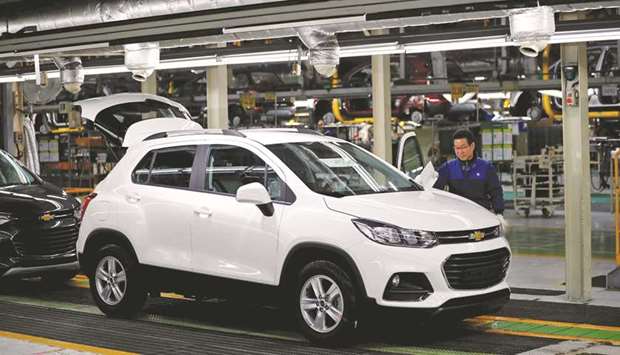 An employee works at an assembly line of GM Koreau2019s Bupyeong plant in Incheon, South Korea. General Motors said its Korean unit, which employs 16,000 people, would likely file for bankruptcy.