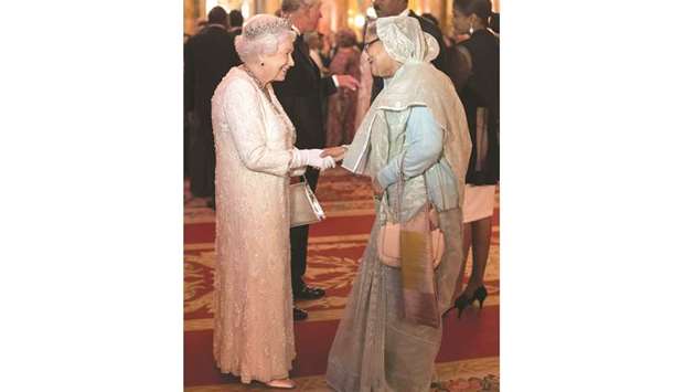 Britainu2019s Queen Elizabeth greets Sheikh Hasina in the Blue Drawing Room at Buckingham Palace as she hosts a dinner during the Commonwealth Heads of Government Meeting in London, Britain.