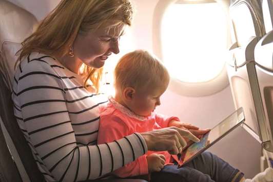 Experts say the safest place for a child on an airplane is in a safety seat and not on a lap.