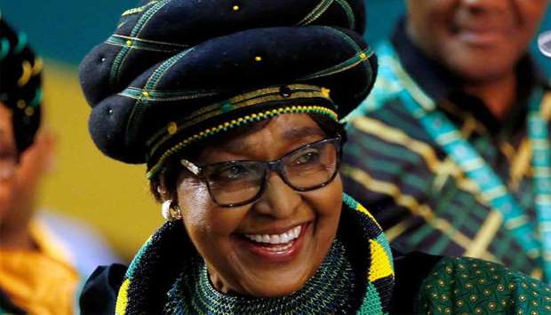 Winnie Madikizela Mandela, ex-wife of former South African president Nelson Mandela, smiles as she arrives for the 54th National Conference of the ruling African National Congress (ANC) at the Nasrec Expo Centre in Johannesburg, South Africa December 16, 2017. Reuters