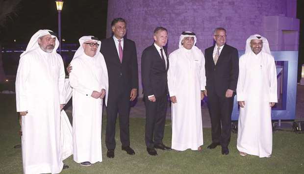 Deutsche Bank officials with dignitaries at the Four Seasons Hotel celebrations.