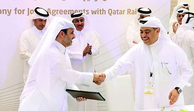 Qatar Rail CEO Abdulaziz Turki al-Subaie and QNB Group CEO Ali al-Kuwari (right) at the signing as HE the Prime Minister and Interior Minister Sheikh Abdulla bin Nasser bin Khalifa al-Thani and HE the Minister of Transport and Communications Jassim Seif Ahmed al-Sulaiti looks on. PICTURE: Shaji Kayamkulam.