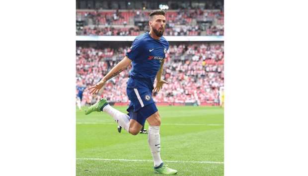 Chelseau2019s Olivier Giroud celebrates scoring his teamu2019s first goal during the English FA Cup semi-final against Southampton at Wembley Stadium in London. (AFP)