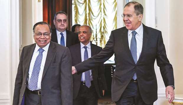 Russian Foreign Minister Sergei Lavrov, right, and his Bangladesh counterpart Abul Hassan Mahmood Ali arrive prior to their meeting in Moscow yesterday.