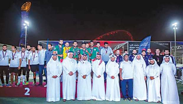 Aspire Zone and Ooredoo officials with the winners of the Ooredoo Temba Championship during the prize distribution ceremony.