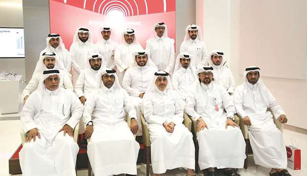 Ooredoo officials with the visiting Qatar Scientific Club members.