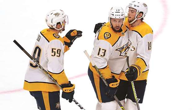 Nashville Predatorsu2019 Nick Bonino (centre) celebrates his goal against Colorado Avalanche with teammates Roman Josi (left) and Calle Jarnkrok during Game Six of the first round of the 2018 Stanley Cup Playoffs in Denver, Colorado, on Sunday. (USA TODAY Sports)