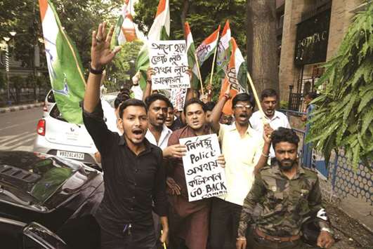 Congress workers stage a demonstration outside the State Election Commission to protest against violence during filing of nominations for the West Bengal panchayat polls, in Kolkata yesterday.