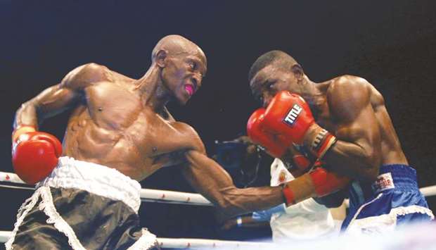 Kenyau2019s Michael Nyawade (left) competes against Nigeriau2019s Waheed Usman during a GOtv featherweight title fight in Lagos earlier this month. (AFP)