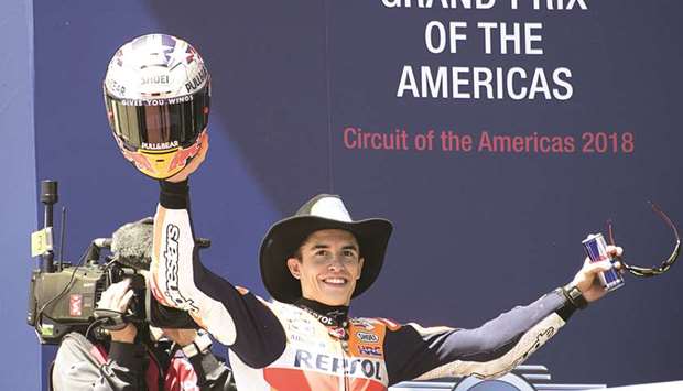 Repsol Hondau2019s Spanish rider Marc Marquez celebrates his victory in the Grand Prix of the Americas on the podium at the Circuit of The Americas in Austin, Texas, on Sunday. (AFP)
